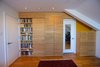 A maple and beeswax wall unit designed by Shannon McCardle provides storage and hides the entrance to the second bathroom behind a sliding door. The mirrored door leads to a walk-in closet. Photo 11 of A Penthouse gets reincarnated - from the 19th Century to the 21st modern home