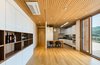 Modern home with Dining Room, Table, Ceiling Lighting, and Medium Hardwood Floor. dining & kitchen Photo 5 of Apple Farm House