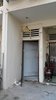 Before: This was the entrance to the duplex apartment. The wooden door had evident signs of wear and tear and could barely shut properly. Photo 7 of The Singapore Designer Loft: A Fusion of Old and New modern home
