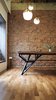 Most of the furniture was designed and customised. This was hand-made in Indonesia. Photo 2 of The Singapore Designer Loft: A Fusion of Old and New modern home