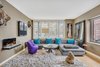 Corner Living Room with Wood Shutters and Fire Place Photo of Now showing for sale: A place to call yours in the city that never sleeps modern home