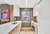 Windowed Kitchen with Custom Bamboo Cabinetry and Recycled Glass Countertops Photo 4 of Now showing for sale: A place to call yours in the city that never sleeps modern home