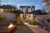 Modern home with Outdoor, Back Yard, Shrubs, Trees, Gardens, Walkways, Hardscapes, Wood Patio, Porch, Deck, Decking Patio, Porch, Deck, Wood Fences, Wall, Horizontal Fences, Wall, Landscape Lighting, and Hanging Lighting. Architect: YAMAMAR Design, Location: San Francisco, California Photo 4 of Randall Street