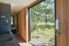 Modern home with Doors, Exterior, and Sliding Door Type. A conservation easement in favor of the Nature Conservancy prohibited permanent development so we customized two shipping containers off site, and then transported the new ‘cabin’ via truck to the property. Together with the client, we chose an ideal landing spot next to an old creek bed, with sunset views of Black Butte cinder cone. The cabin is completely off the grid and can be locked up tight when not in use. Photo 13 of Container Cabin