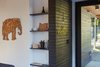 The "hello" coat rack pops against the charred cedar wall Photo 14 of The Mansfield Frogner House modern home