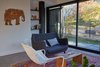 Modern home with Living Room. The living room features a poets sofa, paulistano chair, and a bench I laser engraved Photo 11 of The Mansfield Frogner House