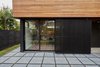 Modern home with Exterior. I built a moveable slat slider to provide some privacy and shading to the main room Photo 18 of The Mansfield Frogner House