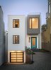 Modern home with Exterior, Stucco Siding Material, House Building Type, and Flat RoofLine. Front entry Photo of SF House-Tech-Art-Play