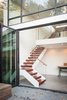 Modern home with Office, Craft Room Room Type, Concrete Floor, Storage, Desk, and Chair. Stairs down to art studio Photo 10 of SF House-Tech-Art-Play