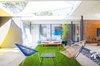 Modern home with Outdoor. Central atrium provides indoor-outdoor enjoyment nearly all year long. Photo 4 of Walnut Creek Eichler Renovation