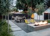 At dusk the fire and lighting extend the hours of use Photo 2 of Refreshing Bungalow modern home
