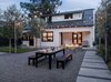 View across the yard at dusk Photo 8 of Refreshing Bungalow modern home