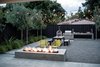 With time the fruitless Olive trees will arch above the space Photo 3 of Refreshing Bungalow modern home