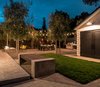 There is room to set up seating for an outdoor movie projected on side wall of the garage Photo 4 of Refreshing Bungalow modern home