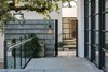 Modern home with Outdoor, Trees, Side Yard, and Shrubs. View from the master bedroom courtyard to the sculpture courtyard Photo 4 of Hilltop Haven