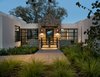 Modern home with Outdoor, Trees, Grass, Shrubs, Landscape Lighting, Concrete Patio, Porch, Deck, Hardscapes, Back Yard, and Garden. A warmly welcoming entrance to the home Photo 6 of Hilltop Haven