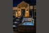 Modern home with Outdoor, Back Yard, Hardscapes, and Landscape Lighting. Elegant lighted water feature Photo 9 of Hilltop Haven
