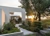 Modern home with Outdoor, Garden, Concrete Patio, Porch, Deck, Trees, Grass, Hardscapes, Gardens, Shrubs, and Walkways. Garden courtyards adjacent to guest rooms Photo 14 of Hilltop Haven