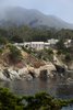 Modern home with Outdoor, Slope, Trees, and Shrubs. An amazing rugged ocean-side site Photo 2 of On the Edge