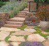 Modern home with Stone Patio, Porch, Deck, Shrubs, Metal Fences, Wall, Side Yard, and Outdoor. Groundcover adds color to flagstone paving and steps Photo 7 of On the Edge