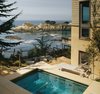 Modern home with Outdoor, Small Pools, Tubs, Shower, Trees, Shrubs, Side Yard, Hardscapes, Stone Patio, Porch, Deck, and Metal Fences, Wall. The spa is positioned to maximize the ocean view, and is sheltered on three sides by bamboo, privacy wall and house. Photo 11 of On the Edge
