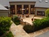 Modern home with Outdoor, Shrubs, Stone Patio, Porch, Deck, Concrete Patio, Porch, Deck, and Metal Fences, Wall. Indoor-outdoor lounge space Photo 14 of On the Edge