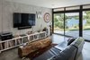 Modern home with Living Room and Concrete Floor. Living room with lake views Photo 2 of Modern Lodge