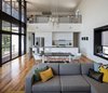 Modern home with Dining Room. Open kitchen and dining area - Space is saved without compromising spaciousness in the public living spaces by using an open plan. Photo 3 of Modern Lodge