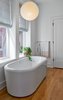 Modern home with Bath Room, Freestanding Tub, and Pendant Lighting. Master Bathroom Photo 13 of The Historic Ely Building