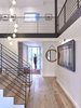 Modern home with Staircase, Wood Tread, and Metal Railing. Entry/Stairway/Balcony Photo of Crestwood Re-Model