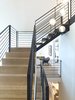 Modern home with Staircase, Wood Tread, and Metal Railing. Feature Stair Photo 2 of Crestwood Re-Model
