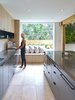 Modern home with Kitchen, Metal Cabinet, Undermount Sink, Engineered Quartz Counter, Microwave, Recessed Lighting, Ceramic Tile Backsplashe, Dishwasher, Open Cabinet, Colorful Cabinet, Ceramic Tile Floor, and Wood Cabinet. Kitchen Photo 14 of Crestwood Re-Model