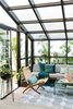 Modern home with Shed & Studio, Sun Room Room Type, Living Space Room Type, and Living Room Room Type. Sunroom with Modernica sofa and folding Wegner chair. Photo 7 of Sea Cliff Preppy Contemporary