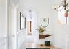 Modern home with Hallway and Light Hardwood Floor. Entry Hallway Photo of Moody Mission Victorian