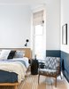 Modern home with Chair, Wall Lighting, Rug Floor, and Light Hardwood Floor. Guest Room Photo 18 of Moody Mission Victorian
