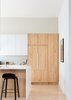 Modern home with Kitchen, Ceiling Lighting, White Cabinet, Laminate Cabinet, Refrigerator, Subway Tile Backsplashe, Light Hardwood Floor, and Wood Cabinet. Kitchen Photo 8 of Moody Mission Victorian