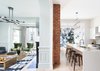 Modern home with Living Room, Accent Lighting, Pendant Lighting, Light Hardwood Floor, Wall Lighting, Ceiling Lighting, Standard Layout Fireplace, Chair, and Sofa. Living and Kitchen Photo 7 of Moody Mission Victorian