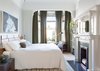 Modern home with Light Hardwood Floor, Rug Floor, Accent Lighting, Pendant Lighting, and Chair. Master Bedroom Photo 13 of Moody Mission Victorian