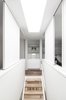 Modern home with Staircase, Metal Railing, and Wood Tread. Third floor / Staircase dividing Master Bedroom into two section Photo 7 of Gazing House