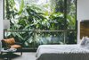 Modern home with Bed, Bedroom, Chair, and Floor Lighting. Intimately intertwined with the jungle’s natural density, Mashpi Lodge is an immensely serene, deeply immersive experience in the heart of an otherwise treacherous land. It’s hard to believe the whitewashed stone structure was erected to stand tall amidst conditions that are constantly damp. Photo of Mashpi Lodge