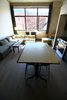 Looking out and over the kitchen island at the living room's "raw" space Photo 4 of Silver Lining Loft modern home