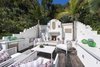 Beautifully adorned backyard patio Photo of Max Ember's Art Deco Inspired Streamline Moderne modern home