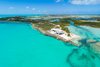 Situated on a 10,000-square-foot private beach and lagoon on the tail of Caicos Banks, the villa was masterfully designed for indoor-outdoor living. Photo 2 of Tip of the Tail Villa modern home