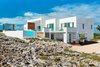 Large terraces off the upper level bedrooms and ample lounge space provide limitless possibilities for relaxing and entertaining.
Photo 3 of Tip of the Tail Villa modern home