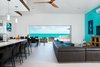 A 20-foot sliding wall of glass reveals incredible views of the turquoise waters and white sand beaches of Turks and Caicos.
Photo 4 of Tip of the Tail Villa modern home