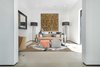 An elegant study off the main entry features a tranquil outdoor garden and faces an open living area with fireplace. Photo 3 of Cherokee Contemporary modern home