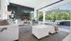 Sliding walls of glass reveal rolling canyons beyond the swimming pool and entertaining areas and create a seamless flow between indoor and outdoor living spaces. Photo 4 of Cherokee Contemporary modern home