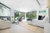 Walls of glass enhance the light and scale of the master suite.
Photo 8 of Cherokee Contemporary modern home