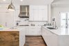 Contemporary kitchen with white lacquer cabinetry and Italian marble Photo 4 of Carbon Beach modern home