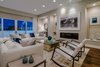 The Great Room with 12-foot ceilings, built-ins, fireplace and adjacent terrace Photo 7 of Carbon Beach modern home